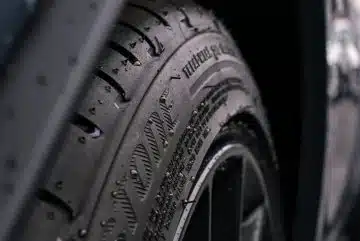 black and gray wheel with tire