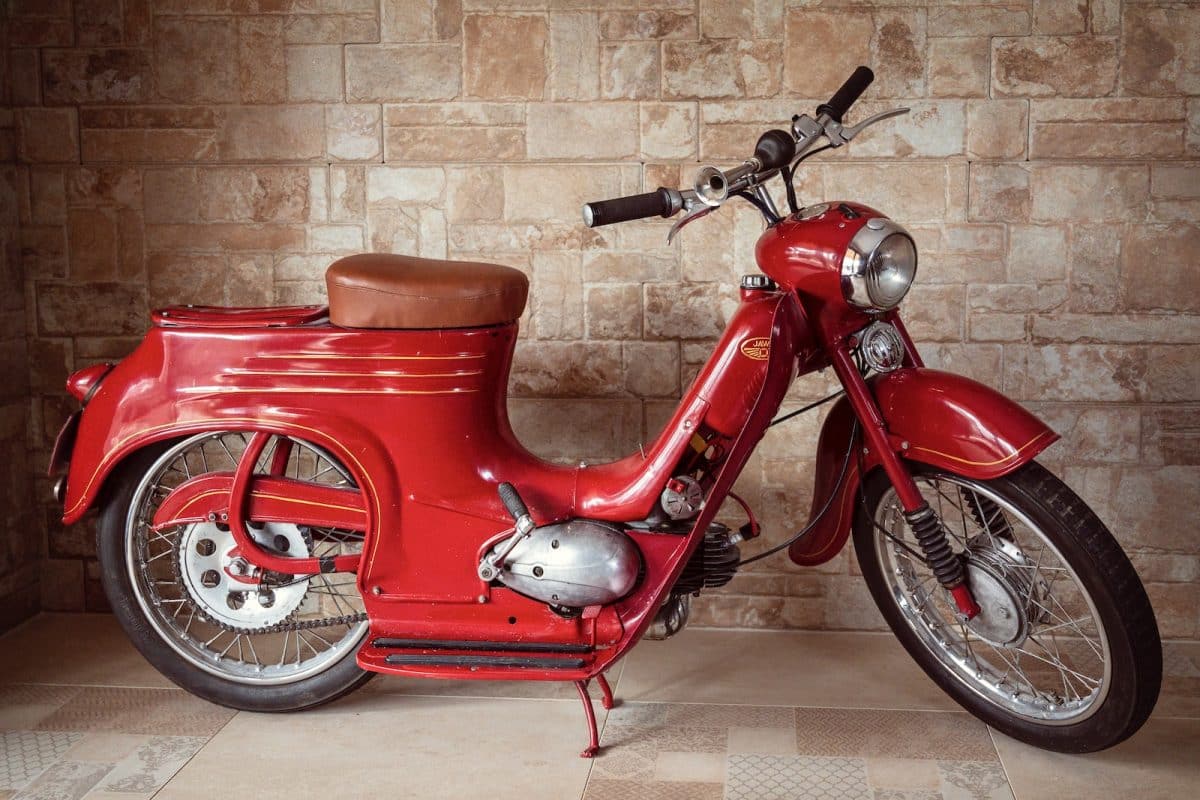 red and black motor scooter